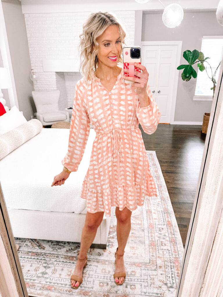 I have a really fun Walmart Spring dress try on haul for you today with 5 dresses all $36 or under! This light pink printed short dress is perfect for spring. 