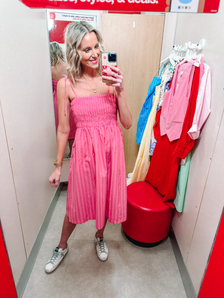 I am sharing a really fun spring Target try on haul including 9 full outfit ideas! You will especially love these dresses to keep you stylish all season long. I love this smocked top pink midi dress with the tie shoulders. 