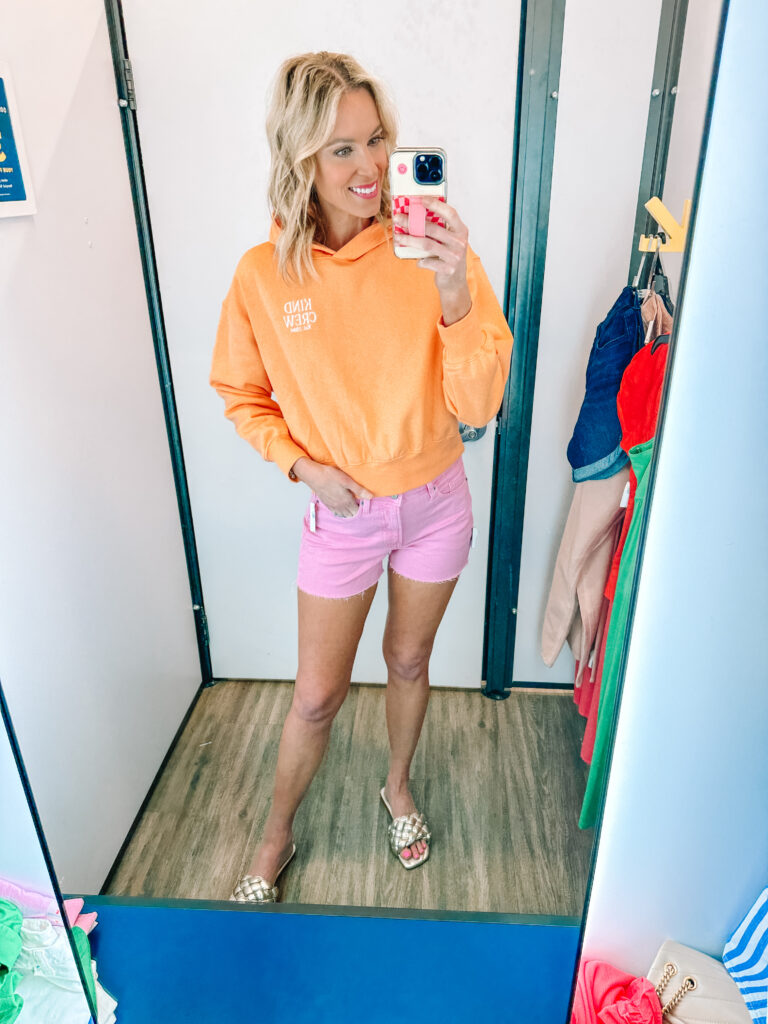How cute is this bright colored hoodie and pink denim short combo?!