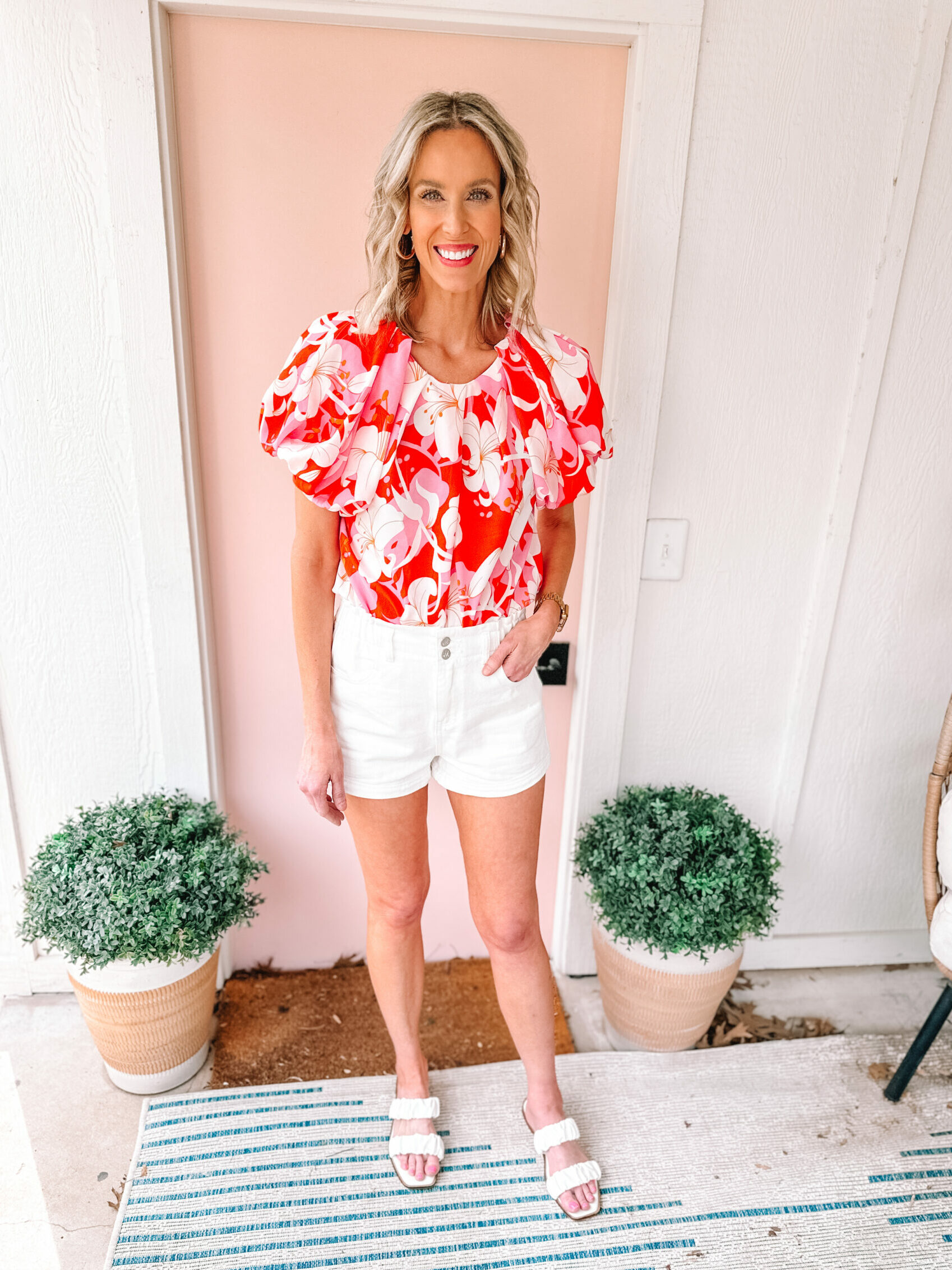 My girl and I are back sharing some more fun mommy and me spring outfits. You can dress these pieces up or down all season long! I love this printed blouse paired with white denim shorts. 