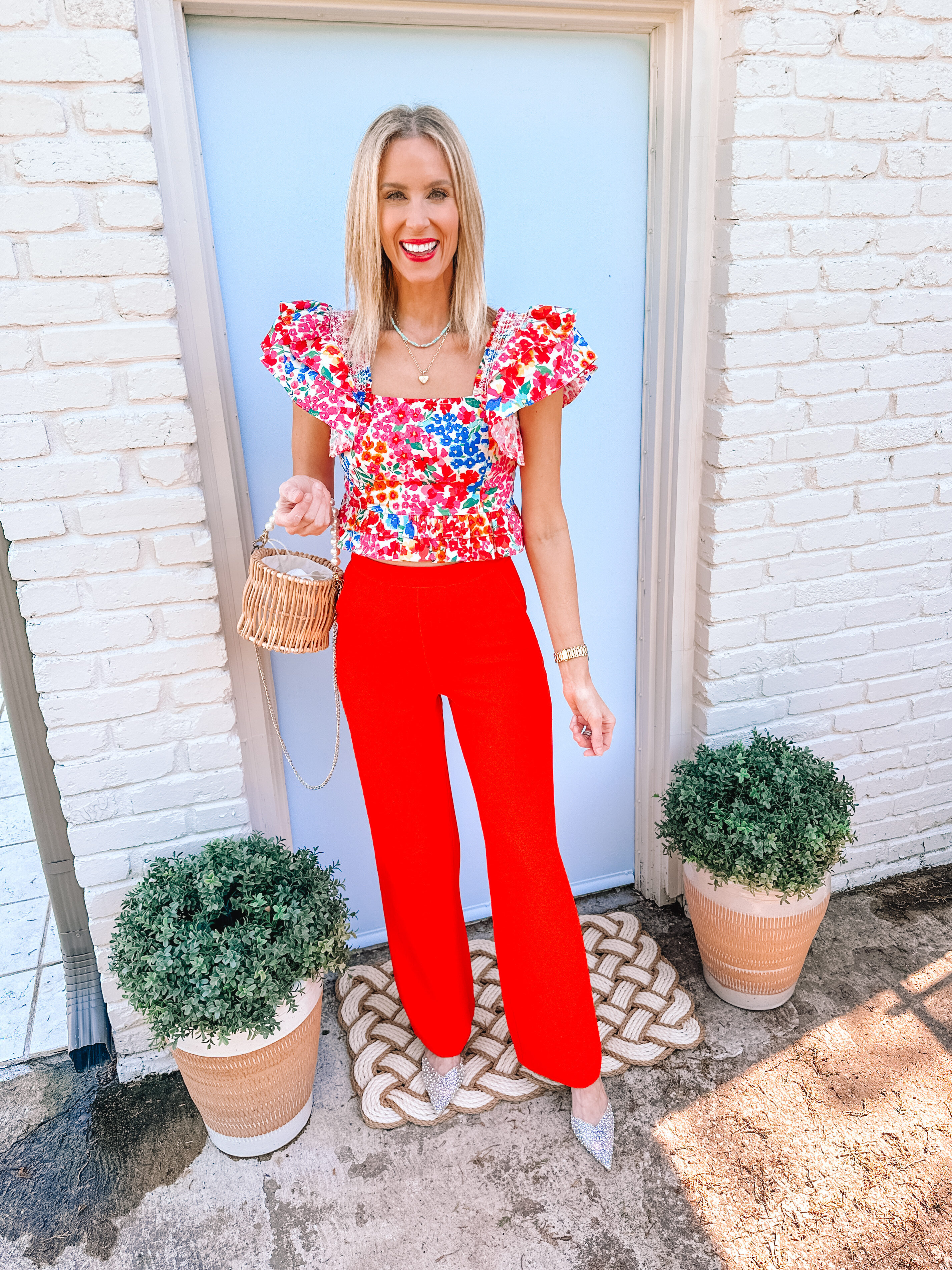 Love color but not sure what to do with it? I'm sharing 10 examples of how to wear colored pants and jeans. You'll be a pro in no time! These red pants are so fun with this floral top. 