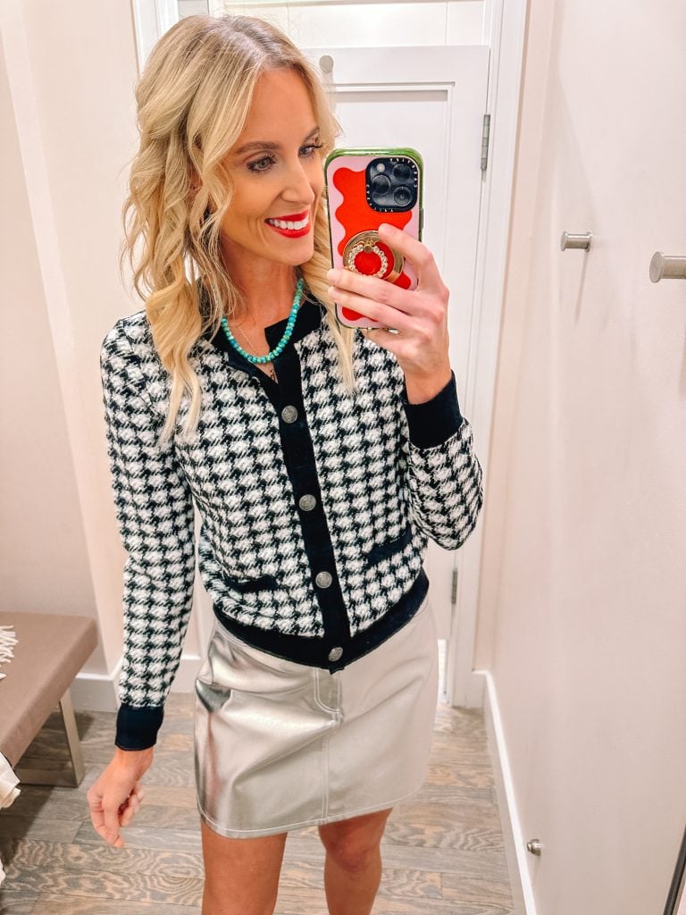 I have a HUGE LOFT try on haul for you with ELEVEN outfit ideas complete with holiday outfit ideas and winter outfits. From dressy to casual, festive and fun, I have it all! I love this black and white sweater with a fun silver mini skirt!